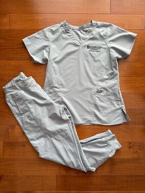 WonderWink Light Gray Scrub Top with Embroidered University Logo